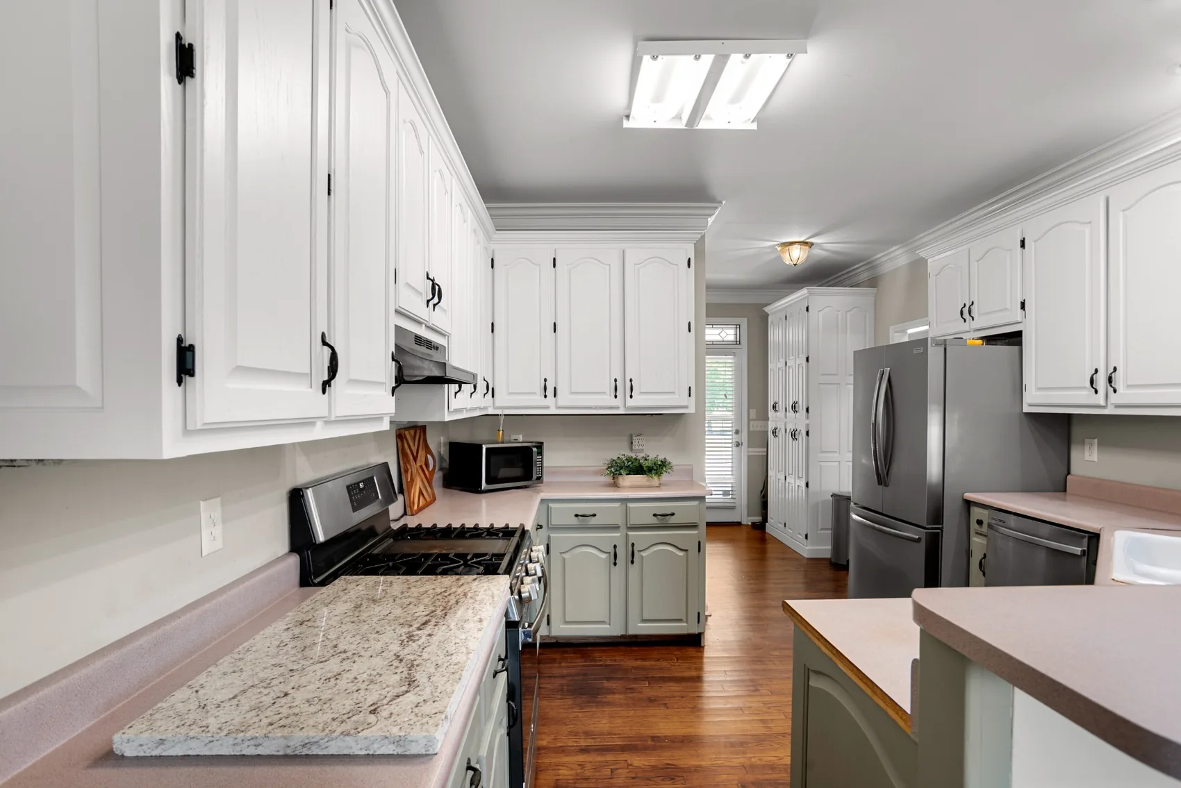 Second perspective of spacious residential kitchen